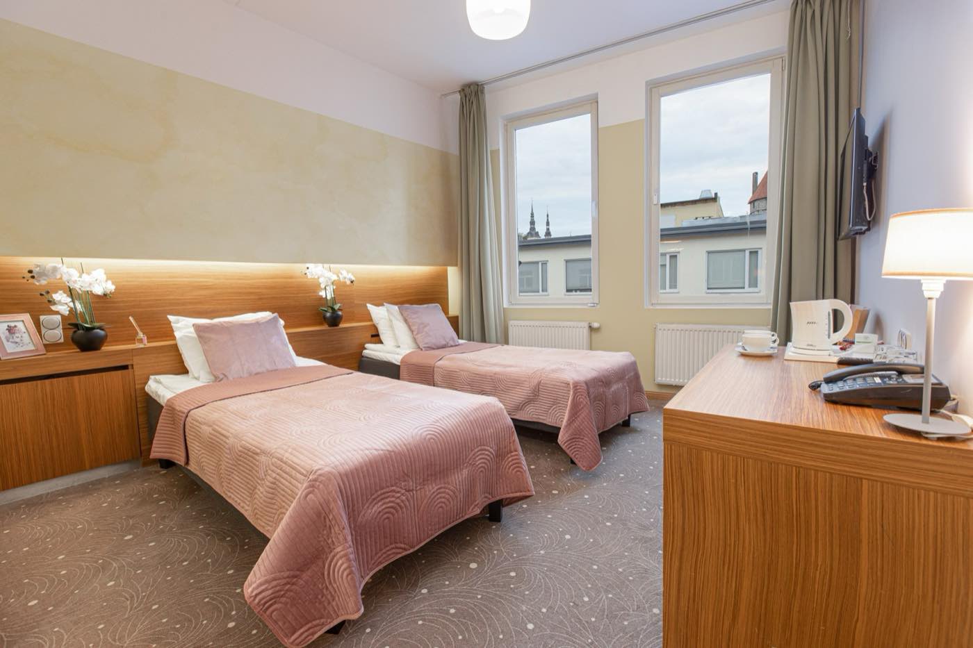 A superior twin room with a view over the rooftops